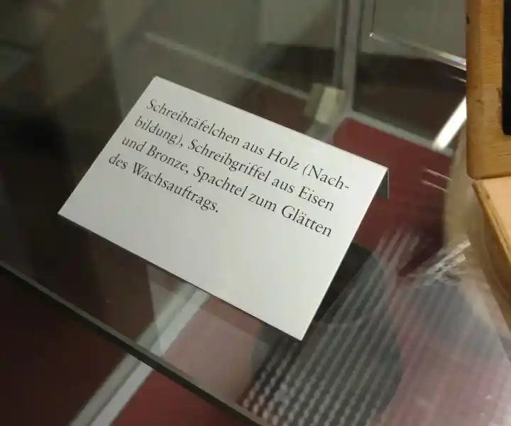 Wooden writing tablet and iron-bronze stylus